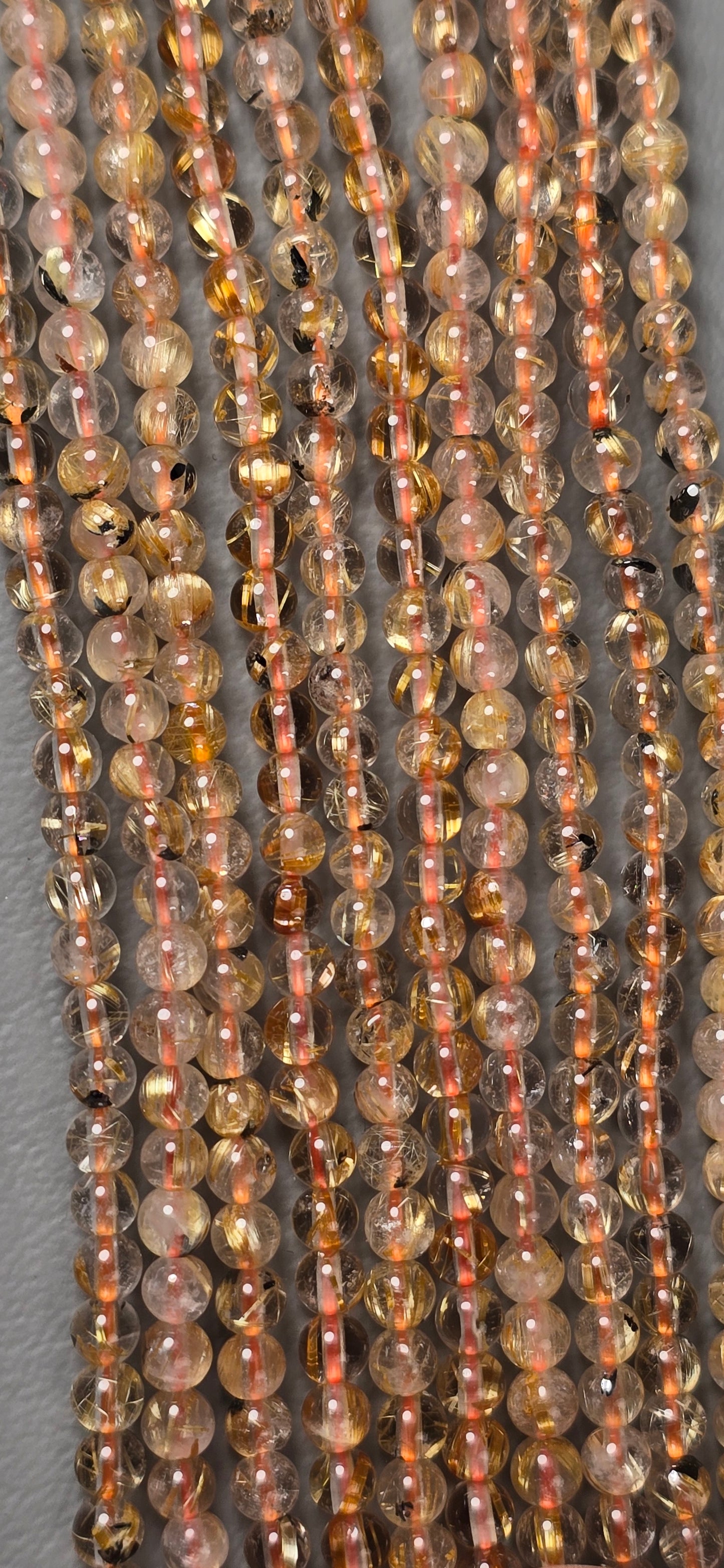 Rutilated Quartz with Hematite Beads - Round