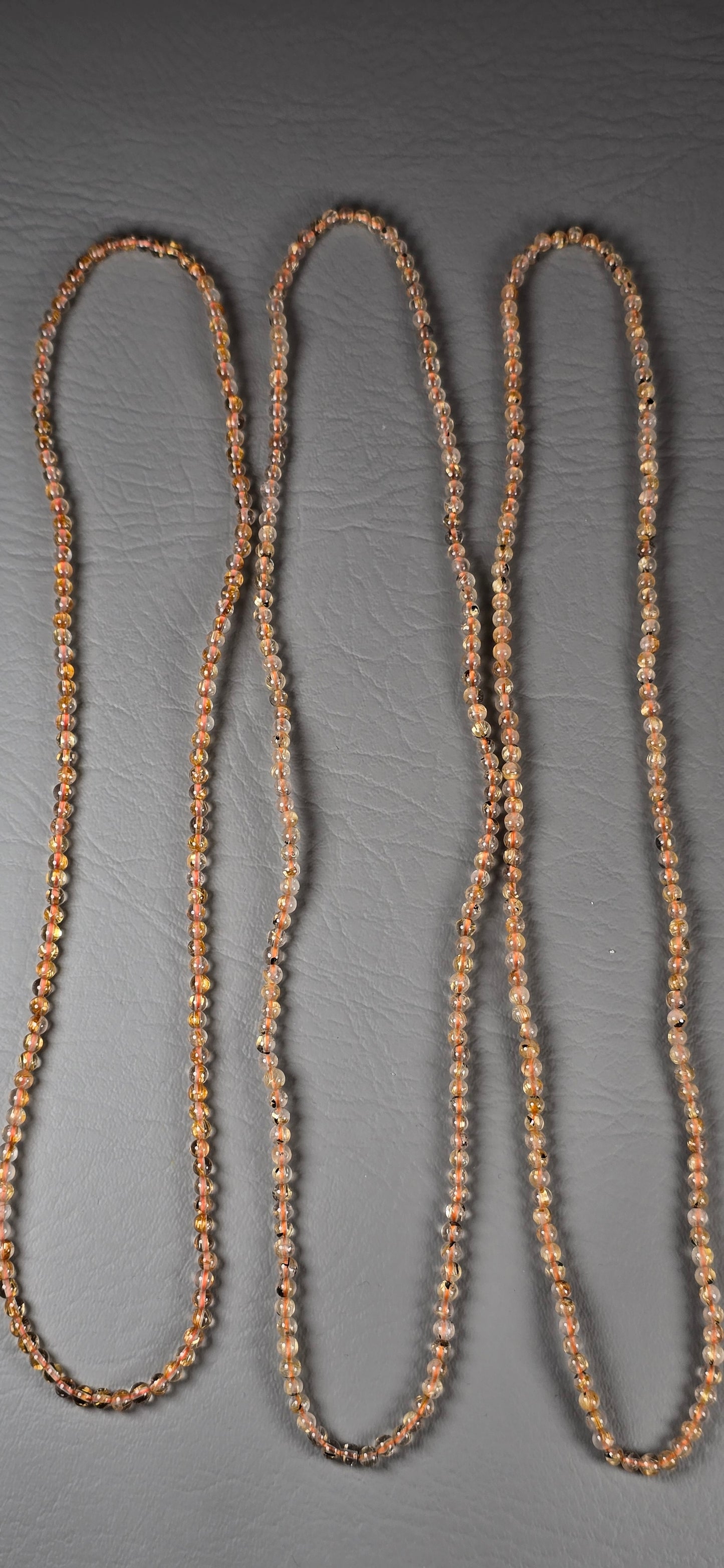 Rutilated Quartz with Hematite Beads - Round