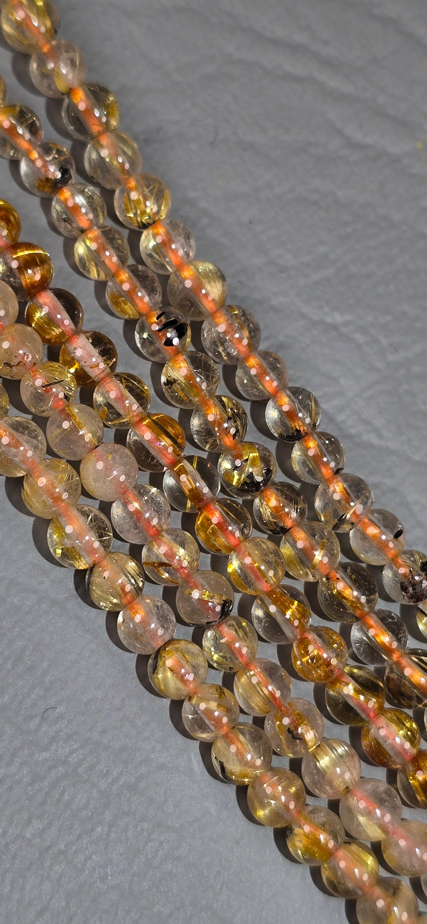 Rutilated Quartz with Hematite Beads - Round