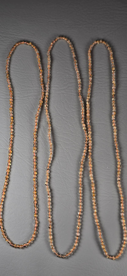 Rutilated Quartz with Hematite Beads - Round